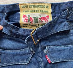 Rare Vintage Levi Strauss & Co Two Horse Brand Jeans Straight Leg Deadstock Levi's Buckle Back Denim Jeans Dark Blue Jeans Men W25 L32  Metal button and zipper fly. * Levi Strauss & Co Two Horse Brand * 100% Cotton * Denim (no stretching) * Size W25 L 32.  XS * Great vintage condition. Not used Measurements Flat: Waist: 14.5'' inch /  36 cm Hips: 18'' inch / 45 cm Front Rise: 9'' inch /  23 cm Inner length: 31'' inch /79 cm Outer length: 42'' inch / 107 cm Width of the legs at the bottom - 5.5" / 14 cm ☆ SHIP WORLDWIDE ☆ I ship from Latvia EU worldwide. Estimated delivery time to: European Union 5 - 7 Business days; USA 2 - 3 weeks; Worldwide 3 - 5 weeks. Thank you for checking in and let me know if you have any questions!  Cheers,  Shop Vintage Commode Blue Jeans Men, Horse Brand, Two Horses, Dark Blue Jeans, Jeans Men, Levi Strauss & Co, Brand Jeans, Jeans Brands, Levi Strauss