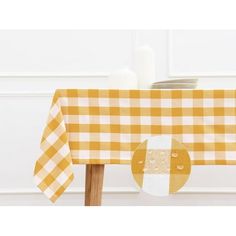 a yellow and white checkered table cloth