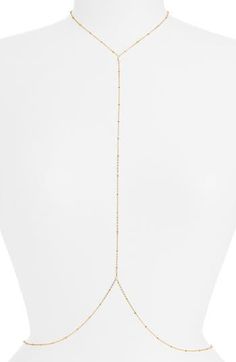 Glam up your look with this dainty body chain detailed with beaded stations for elegant sparkle. 18k-gold plate or sterling silver plate Made in the USA or imported Delicate Adjustable Gold Body Jewelry, Gold Beaded Chain Adjustable Body Jewelry, Adjustable Delicate Body Jewelry With Chain, Delicate Adjustable Gold Body Chain, Gold Lariat Body Jewelry As Gift, Adjustable Gold Dainty Body Chain, Dainty Adjustable Gold Body Jewelry, Dainty Adjustable Gold Body Chain, Gold Pearl Chain Body Chain As Gift