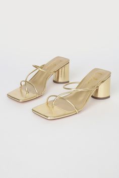 Lulus Exclusive! The Lulus Jocelynn Gold Strappy High Heel Sandals will add a flirty touch to your next romantic date or soiree! Smooth faux leather shapes these chic heels with a trendy square toe upper, a toe loop, and an overlapping, strappy vamp. An easy slide-on design atop a contoured, block heel makes these heels a must-have! 2. 5" wrapped contoured block heel. Cushioned insole. Rubber sole has nonskid markings. Man made materials. Imported. Lulus | Jocelynn Gold Strappy High Heel Sandal Gold Heels Small Heel, Cute Small High Heels, 3 In Heels, Gold Heels 2 Inch, Prom Shoes Low Heeled Gold, Gold Heels Black Dress, Block Kitten Heels, Gold Hoco Shoes