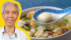 an older man is holding a spoon over a bowl of soup with shrimp and scallops