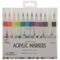 the acrylic markers are set up in a box with different colors and sizes