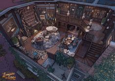 an aerial view of a living room and dining area in a house with lots of bookshelves