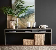 a living room scene with focus on the coffee table and vases in front of it