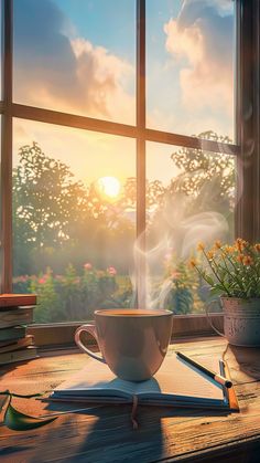 a cup of coffee sitting on top of a table next to a book and potted plant