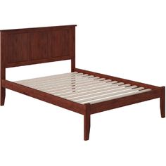 a wooden bed frame with slatted headboard and foot board, made in the usa