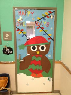 a door decorated with an owl wearing a hat