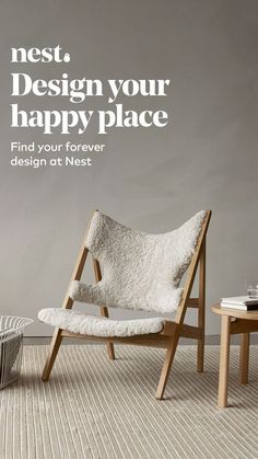 a white chair sitting on top of a hard wood floor next to a wooden table