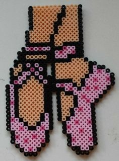 four pieces of beaded art made to look like handmade hamonos with pink and black beads