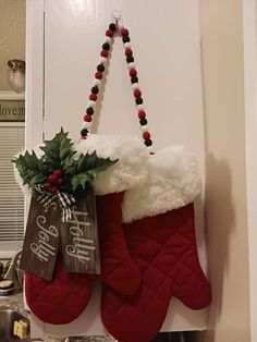 two christmas stockings hanging on the wall