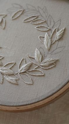 a close up of a embroidery on a table