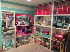 a room filled with lots of toys and shelves full of different types of items on top of each shelf