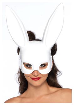 a woman wearing a white bunny mask on her face