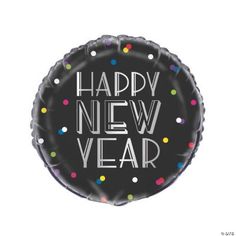 a foil balloon with the words happy new year printed on it and multicolored confetti