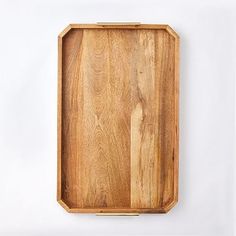 an empty wooden tray on a white background