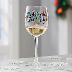 a wine glass that says let's get lit