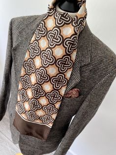 SUPER VINTAGE 1970's RETRO MOD BROWN AND BEIGE POLYESTER FEEL RETRO PATTERN LONG SCARF CRAVAT rare one off great look  good condition  please note all our scarves are vintage so might show some signs of wear Brown Vintage Winter Scarves, Vintage Brown Winter Scarves, Vintage Brown Winter Scarf, Brown And Beige, Retro Pattern, Long Scarf, Scarf Wrap, Labour Day, Scarf Accessory