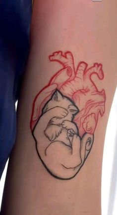 a tattoo on the leg of a person with a heart