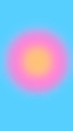 a blurry image of a blue sky with pink and yellow circles on the center