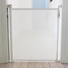 an open door with a white screen on it