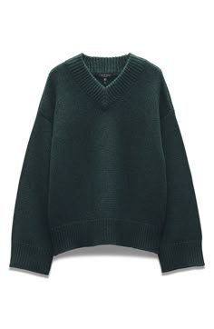 Sweater weather is even better in this supercozy V-neck option made from soft, cashmere-kissed wool. 24" center front length (size Small) V-neck Long sleeves Dropped shoulders Ribbed cuffs and hem 90% wool, 10% cashmere Dry clean Imported Emerald Green Cashmere Sweater, Green Oversized Sweater, Dark Green Sweater, Green Knit Sweater, Green Wool, Green Sweater, Oversized Sweater, Sweater Weather, V Neck Sweater