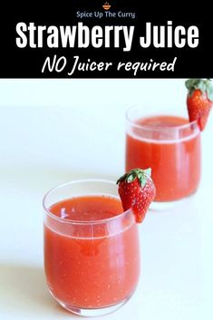 two glasses filled with fresh strawberry juice on top of a white table next to strawberries