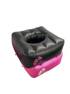 an inflatable float is shown with pink flowers on the bottom and black sides