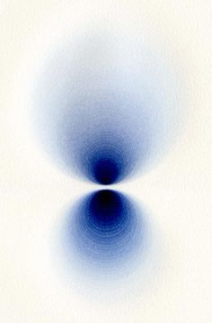 an abstract blue and white background with circles in the center, on top of a white surface