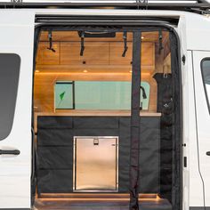 the interior of a van with its doors open