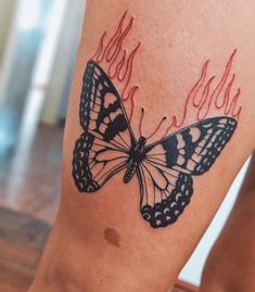 a woman's leg with a butterfly tattoo on it and the words miss you