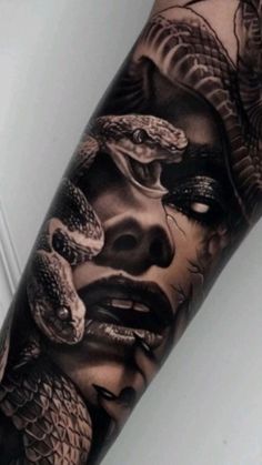 a man's arm with a snake on it and a woman's face