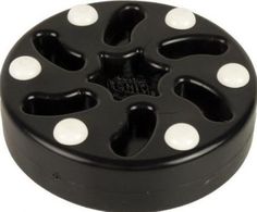 an image of black and white knobs on the top of a wheel tire cover