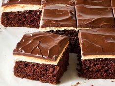 chocolate cake with frosting cut into squares