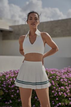 Why We Love It： Get ready to win on the court or take on the streets with this chic and comfortable must-have. Featuring a classic design and lightweight feel, this piece comes with a comfy inner short and all-around pleats for a cute and sweet touch. Don't miss out on this versatile addition to your wardrobe. Fit and Features： Comfy inner short with side pocket Sweet, pleated A-line skirt High-rise & Hits above upper thigh The model is 5′9.4″, with a 33.5” bust, 26” waist & 37.5” hips – she wea Tennis Set, Push Up Pads, Photoshoot Inspo, Crop Top Skirt, Estilo Chic, Activewear Sets, Fashion Board, Tennis Skirt, The Court