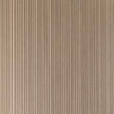 a brown wall with vertical lines on it