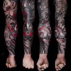 two men with tattoos on their arms and legs are standing in front of each other