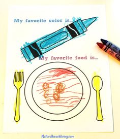 a blue crayon pencil sitting on top of a piece of paper next to a plate