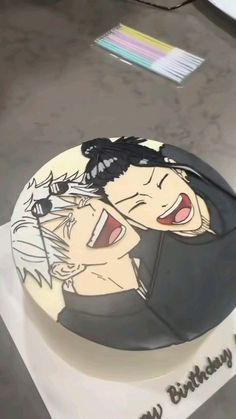 a birthday cake with an image of two people holding each other's shoulders and laughing