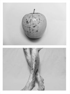 an apple with black spots on it sitting next to a white wall and another photo of the same person's legs