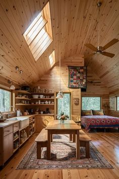 a living room with wood floors and ceiling