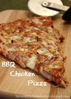 a slice of pizza sitting on top of a wooden cutting board