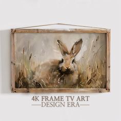 a painting of a rabbit in grass with the words 4k frame tv art design era