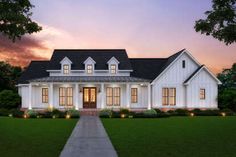 this is an artist's rendering of the front elevation of a farmhouse style home