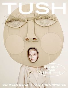 a poster with a woman's face in the middle of her head and words that say, tush