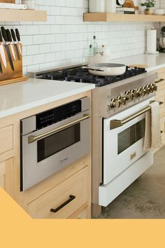 a kitchen with an oven, stove and counter tops