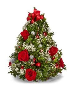 a christmas tree with red roses and baby's breath