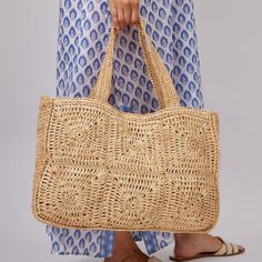 A timeless and chic tote that you can wear from spring to summer! Beautifully designed and detailed to be a great accessory for running to the market and days in the sun. Optional leather loop included to hold your favorite brimmed hat. Product Overview: Material: 100% Raffia, 100% Linen Lining Measurements: 47cm x 32cm x 12cm Spot Clean with Damp Cloth Spring Bohemian Rectangular Bucket Bag, Bohemian Shoulder Bag For Spring Travel, Elegant Bucket Bag With Braided Handles For Beach, Summer Beach Bag With Braided Handles For Everyday, Summer Bucket Bag With Braided Handles For Everyday, Chic Natural Beach Bag With Double Handle, Elegant Beach Bag With Leather Handles For Vacation, Elegant Straw Tote Bag For The Beach, Elegant Tote Straw Bag For The Beach