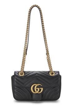 Find GUCCI Gg Marmont Shoulder Bag on Editorialist. This Gucci GG Marmont Shoulder Bag features a quilted design, a gold-tone logo, and a chain strap. It can be worn on the shoulder or crossbody. Luxury Crossbody Shoulder Bag With Gold Chain, Gucci Shoulder Bag With Gold-tone Logo For Everyday Use, Gucci Shoulder Bag With Gold-tone Logo Plaque, Chic Gucci Shoulder Bag With Metal Logo, Luxury Shoulder Bag With Gold Chain, Gucci Gold Bag With Gold-tone Logo Plaque, Gucci Shoulder Bag With Gold-tone Hardware, Luxury Gold Quilted Bag, Luxury Quilted Gold Bag