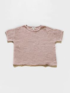 The perfect spring staple, our Muslin Top is a relaxed-fit t-shirt style made from our airy organic cotton muslin. Sizes up to 24mo include a coconut button at the back for easy on and off. This top pairs like a dream with our Muslin Short or Muslin Trouser. • Discover our matching adult’s version here• Composition: 10 Spring Staples, T Shirt Style, Short Sleeve Pullover, Boys Shirts, Pullover Styling, Shirt Style