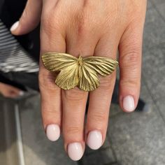 Butterfly ring in gold color, Whimsical ring, Unique statement brass ring with wings, Bold rings, Adjustable size ring, Nature lover gift. The ring is crafted based on an a real butterfly with wings. It is made of high-quality brass. The dimension of the butterfly is 5x2,5cm / 1.97x0.98 inches. It features an adjustable size. The band is open, allowing for size adjustments. It fits best sizes US 4-10 / EU 7-22. It can be adjusted to larger sizes by a few more, however, in this case, there may be Fairycore Ring, Ring With Wings, Whimsical Ring, Rings Adjustable, Butterfly Necklace Gold, Real Butterfly, Bold Rings, Butterfly Ring, Gold Butterfly